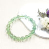 Natural green fluorite bracelet for focus, clarity, and anxiety relief, handmade healing crystal jewelry.