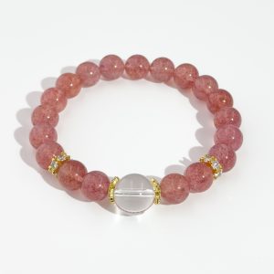 Strawberry quartz beaded bracelet with clear round center crystal and gold accent rings