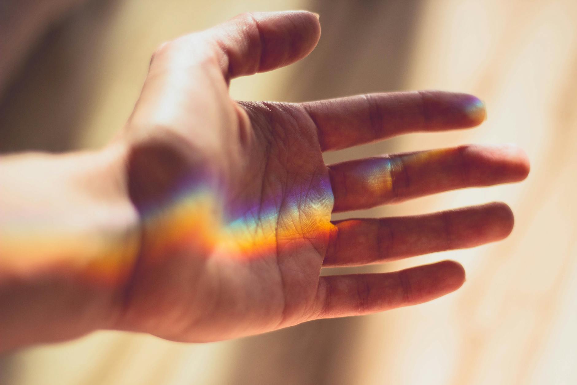 Hands holding crystals with light energy overlay-photo-by-pexels